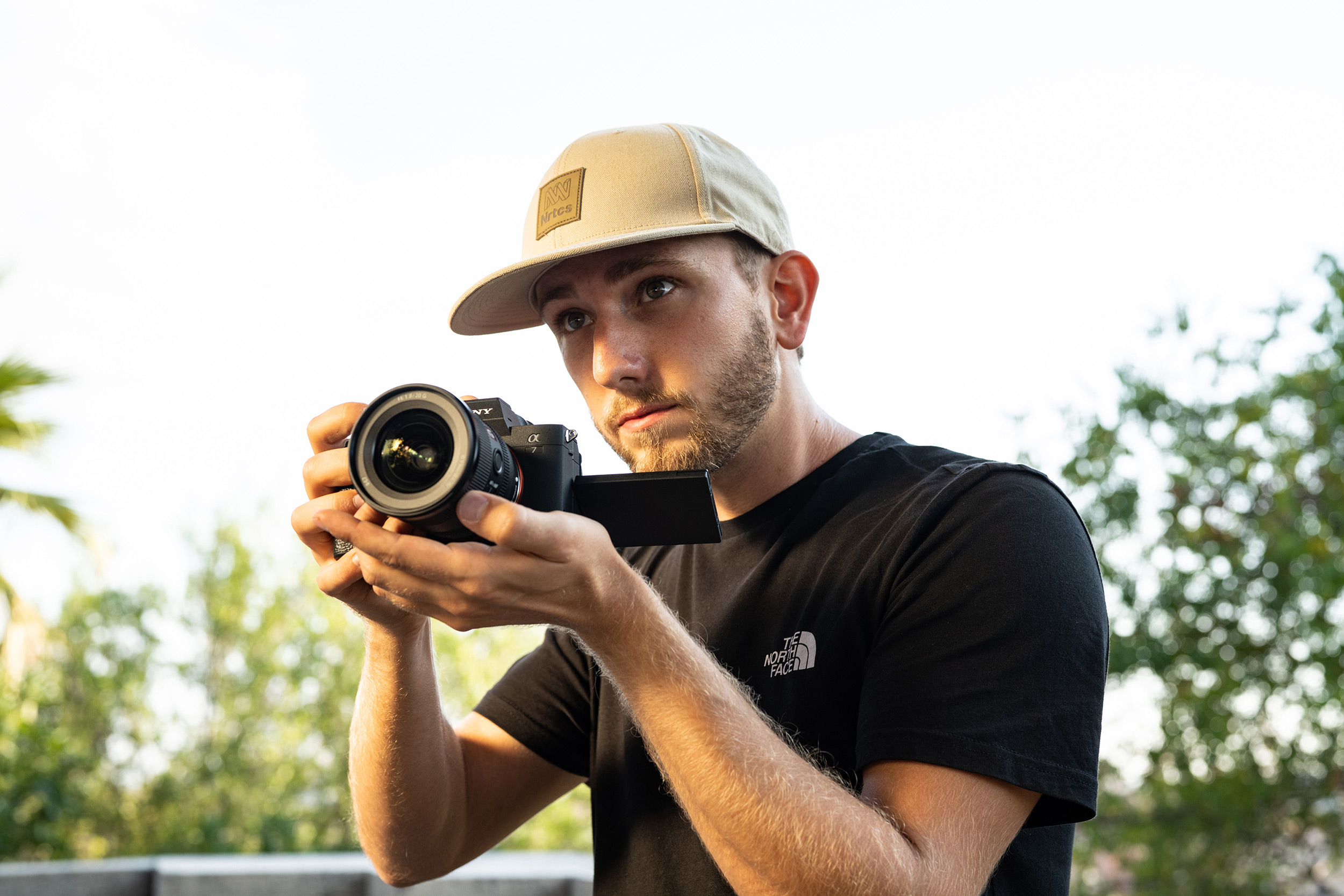 matteo-bruno-looking-up-as-he-frames-a-shot-on-his-sony-a7m4.jpeg